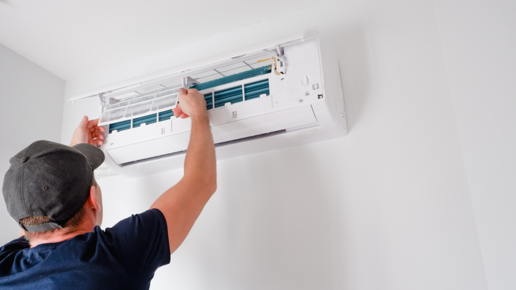 Air quality HVAC tech working on a Air Purifier